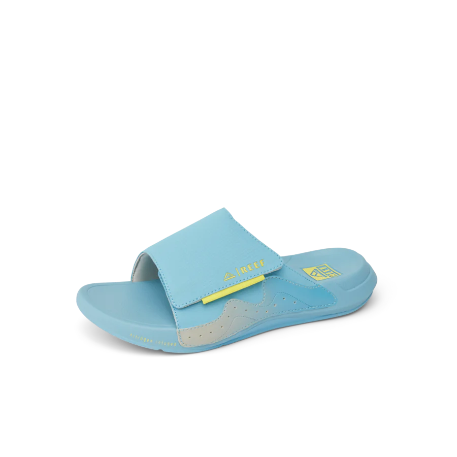 CJ7256_SWELL_CRUISER_SLIDE_LIGHT_BLUE_YELLOW_LS-900x900-c4cc11b.webp