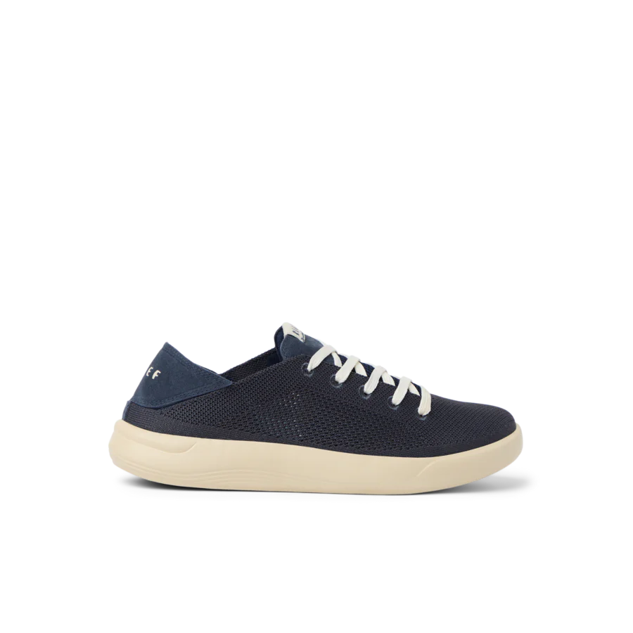 CJ8525_SWELLSOLE_NEPTUNE_TRUE_NAVY_RS_SHADOW-900x900-c4cc11b.webp