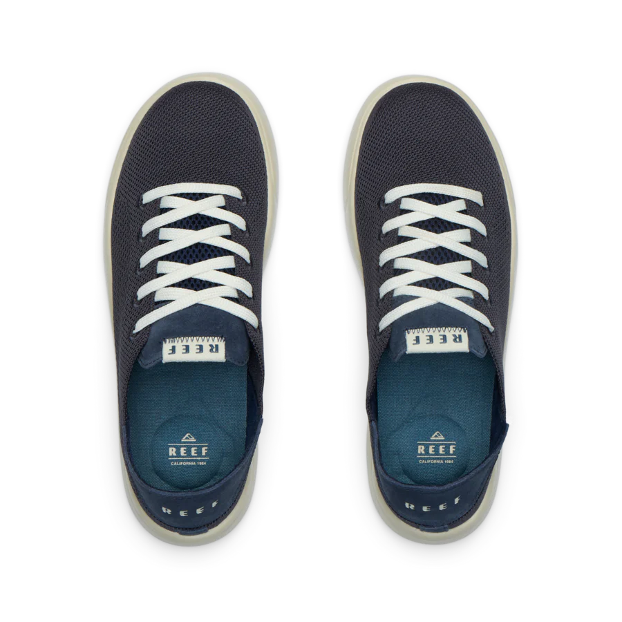 CJ8525_SWELLSOLE_NEPTUNE_TRUE_NAVY_T_SHADOW-900x900-c4cc11b.webp